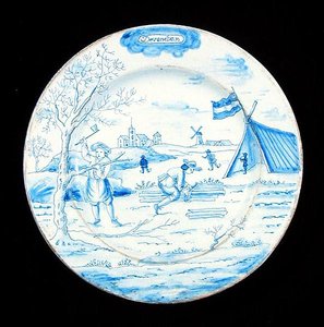 描绘12月的Delftware盘子（锡釉陶器） 作者 荷兰学校