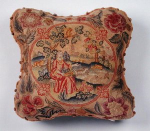 坐垫，用小圆点刺绣，描绘了一个风景中的女人（纺织品 作者 英语学校