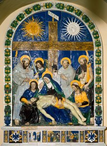 The Deposition (Pieta)” Jesus Christ and the Virgin Mary surrounded by Saint John and Saint Mary Magdalene before the cross with the inscription INRI (I.N.R.I.) High relief ceramic by Giovanni della Robbia (1469-1529) 1525 Dim. 287x210 cm Santuario della V