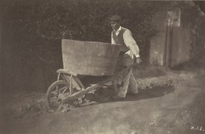带着手推车的男性农民，1870年。