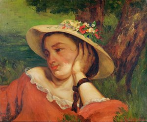 草帽的妇女有花的，c.1857