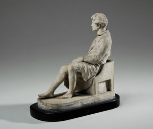 乔治·班克斯（George Banks）坐着的马凯特（Maquette）