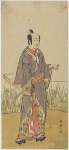 （手持竹笛的武士演员）