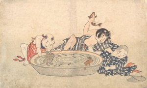 男孩与一盆鱼和乌龟玩耍，19世纪初。