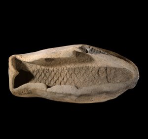 Mesopotamie: terracotta mold in the shape of fish. Around 1800 BC. From the royal dishes of the Palace of King Zimrilim a Mari. Paris, Louvre Museum 作者 美索不达米亚