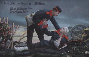 日落西山：一名德国士兵在战场上安慰他即将死去的战友（彩色照片）。 作者 德国摄影师