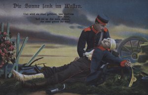 夕阳西下：一名德国士兵在战场上安慰垂死的战友（彩色照片） 作者 德国摄影师