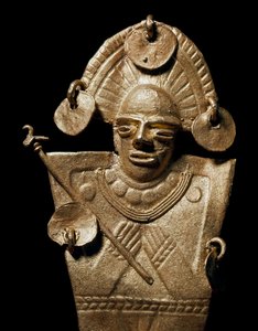 Precolombian art, Muisca civilization: statuette of woman (Tunjo) in gold ceremonial costume. 15th-17th century. Bogota, Museo de Oro, Colombia - Pre-Columbian art, Muisca culture (15th-17th AD): gold statue of a tunjo, a woman wearing a ceremonial costume