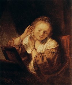 耳环的年轻女子，1657年 作者 伦勃朗·范·赖恩