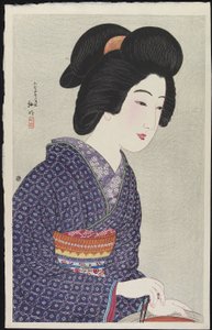 1925年2月坐在火盆旁的女人