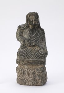 一位佛教牧师的小雕象