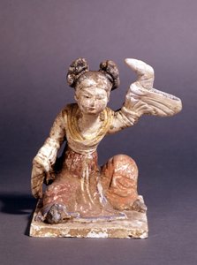 描绘唐朝（或唐朝）传统服装的女人的塑像。 作者 唐代中文学校