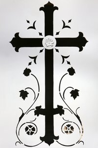 Cross on a white door