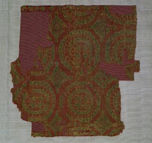 萨米特人与玫瑰花结轮，700-800年代。 作者 不明