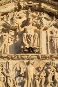 Sculpture of the Christ seated on a throne. The Last Judgment. Tympanum of the western central portal. St. Stephen