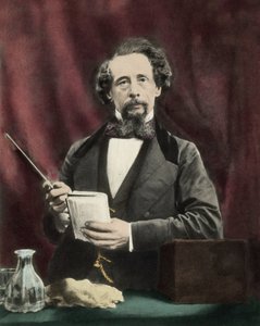 查尔斯·狄更斯 (1812-1870) 在 1860 年左右的阅读中。 作者 未知艺术家