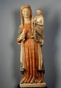 处女和孩子 处女手里拿着一只鸽子。 彩色石雕。 15世纪。 Montaigu les Bois 教堂。 作者 未知艺术家