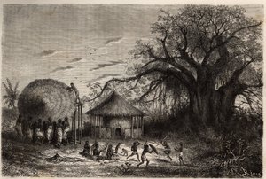Women from the edges of Zambeze waving huts and in the foreground, children