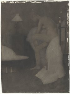 坐在床边的裸女