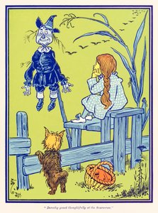多萝西若有所思地凝视着稻草人。来自？绿野仙踪？作者：L。Frank Baum