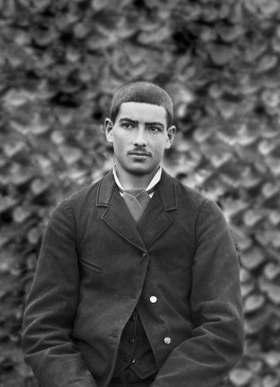 Portrait of a young man, in the garden of the Abbey of Septfontaines, near Bourmont en Haute Marne. Photography late 19th century. Ducos Collection. 作者 法国摄影师