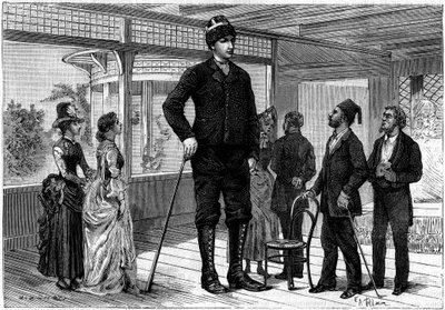 Amanab（或Auvassab，本名Amenates Tingitsoglu 1868-1887），一个身高2.36米的希腊巨人，在欧洲各国首都转了一圈，他在儒勒-凡尔纳（1828-1905）的故事《一个怪人的意志》中激发了一个巨人。在 "La Na "中的雕版画 作者 法语学校