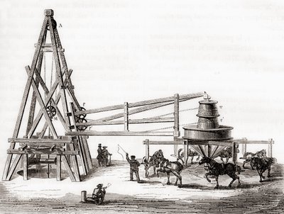 19 世纪，工人在法国 Grenelle 使用旋转木马和绞盘钻自流井，出自 1870 年出版的“Les Merveilles de la Science”（雕刻） 作者 法语学校