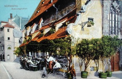 描述纽伦堡Bratwurstglocklein餐厅的明信片，1914年前（彩色照片）。 作者 德国学校