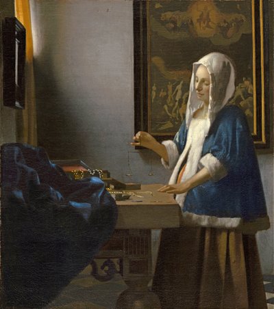 女人抱着一个平衡 作者 Jan Vermeer van Delft