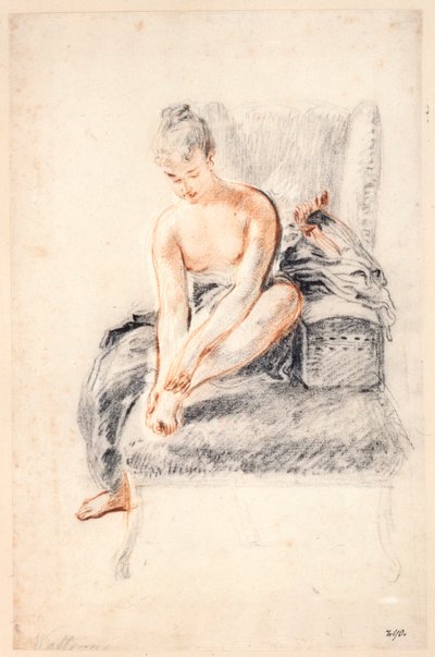 少妇，裸体，在她的手上握一只脚，1716-18。 作者 Jean Antoine Watteau