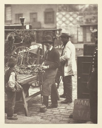 街头锁匠》，1881年。 作者 约翰汤姆森