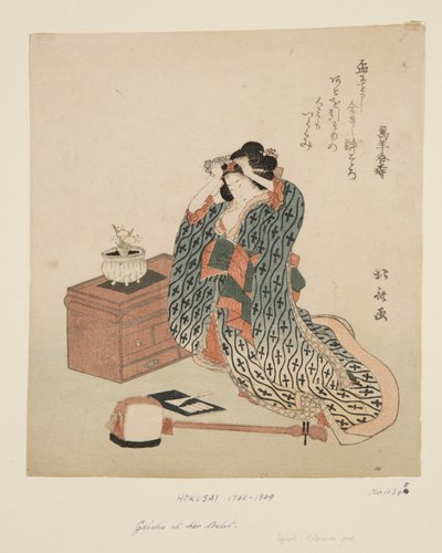 三味线演奏家在调整头发（彩色木版画 作者 葛饰北斋