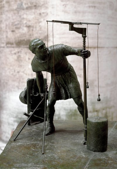 Roman art: “” the gromatician”” A surveyor (agrimeners) measures the land using a groma (gruma). Bronze sculpture. Rome, Museum of Roman Civilization 作者 罗马罗马