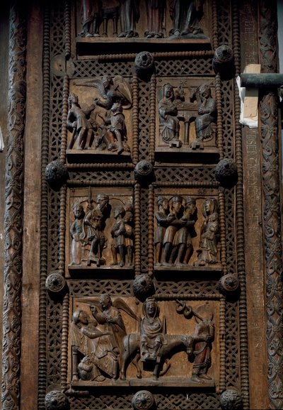 罗马式艺术：德国科隆国会大厦圣玛丽教堂（Sankt Maria im Kapitol，Koln）的 12 世纪中叶木门。 描绘对牧羊人的公告、耶稣诞生、法师的崇拜和 th 的场景 作者 罗马式