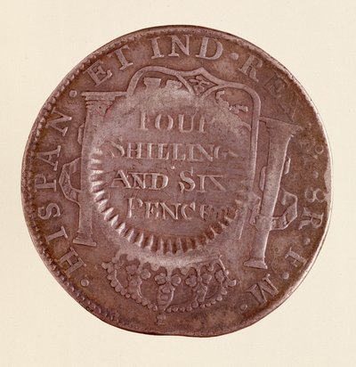 Silver coin (8 reales) from Spain: reign of Charles III (1759-1788). 1777 with countermark of 1787. Diam. 3.9 cm Naples, museo archeologico 作者 西班牙语学校