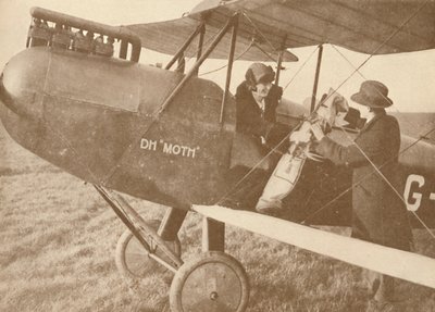 乘飞机飞到27-60马力的飞蛾轻型飞机上的高尔夫球杆上，1927年 作者 不明