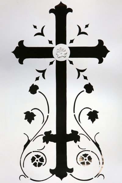 Cross on a white door