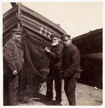 Fishermen standing by a net, c 1905 作者 不明