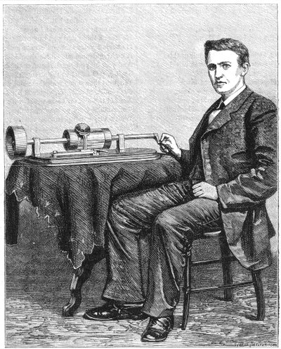 美国发明家托马斯·阿尔瓦·爱迪生（Thomas Alva Edison），他的留声机是早期的手动模型，1878年 作者 不明