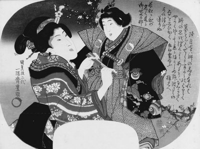 Aiban uchiwa-e：一个女人打扮她的孩子 作者 歌川国贞