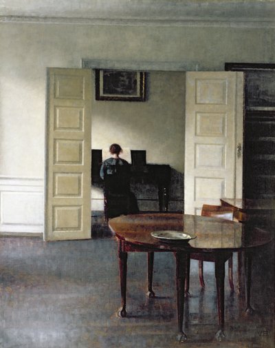内部与一个女人弹钢琴，1910年 作者 Vilhelm Hammershoi