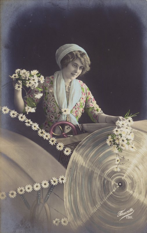 一个年轻的女人抱着大量的鲜花和在工厂工作（有色photocollage） 作者 法国摄影师